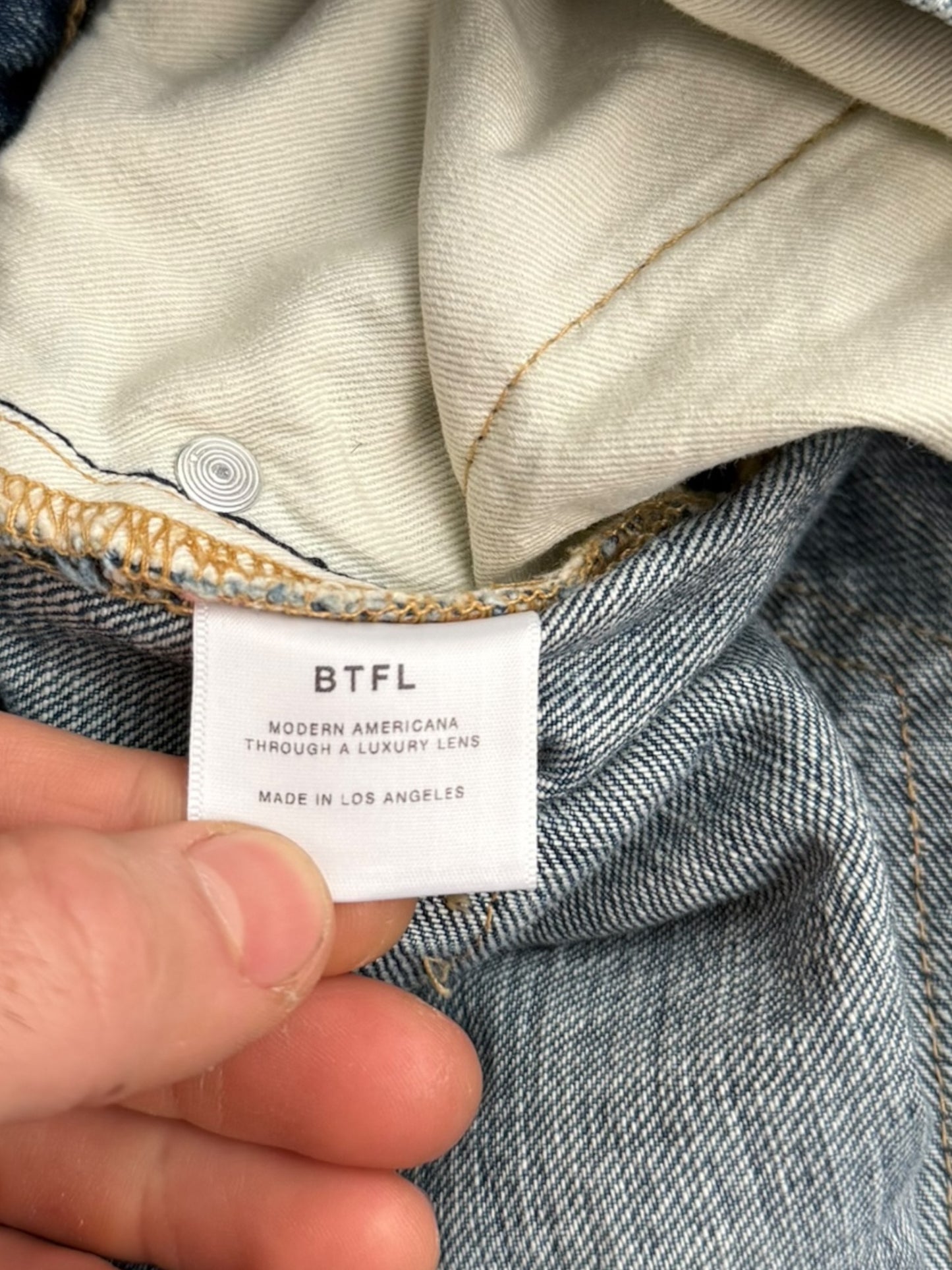 Distressed Blue Denim Jeans