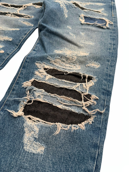 Distressed Thrashed Denim Jeans