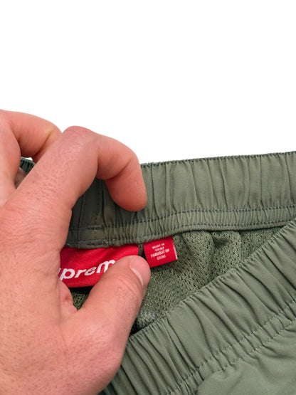 2023 Warmup Logo Zip Pants Olive