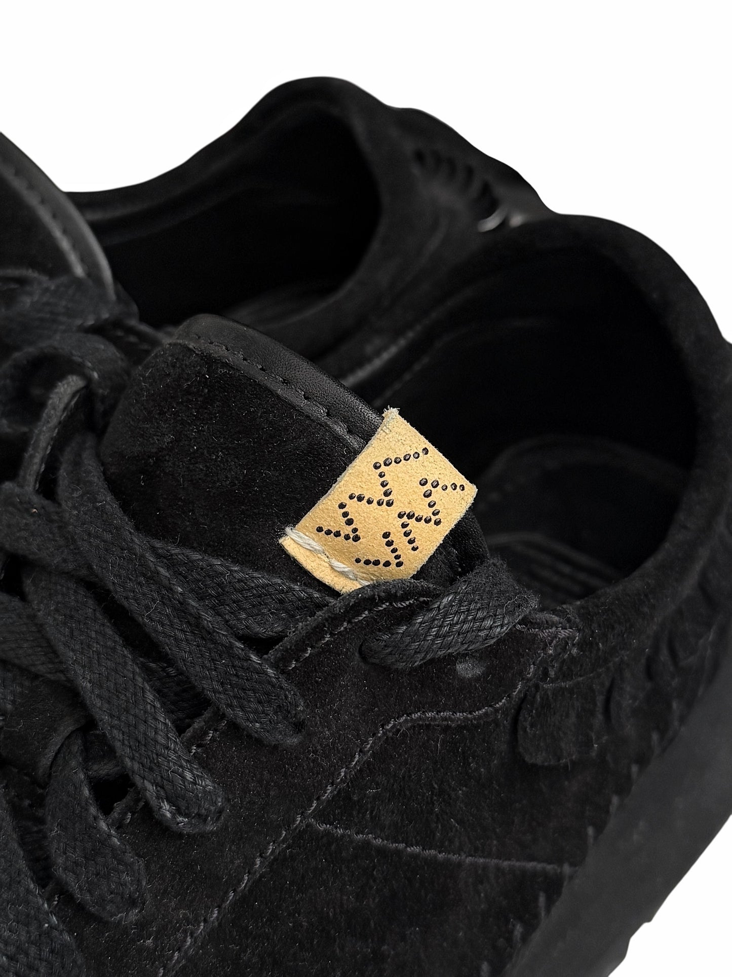 Walpi Suede Black Fringe Runner Sneaker