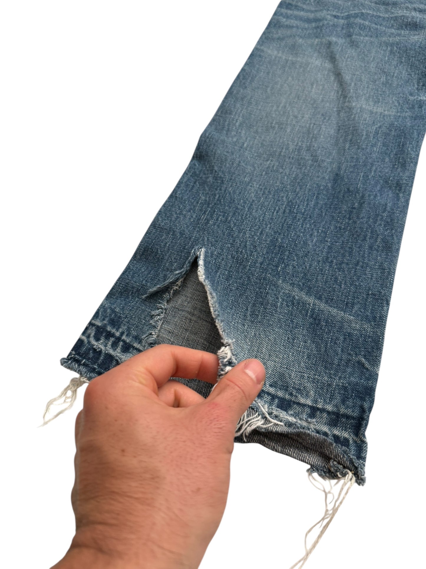 Distressed Blue Denim Jeans