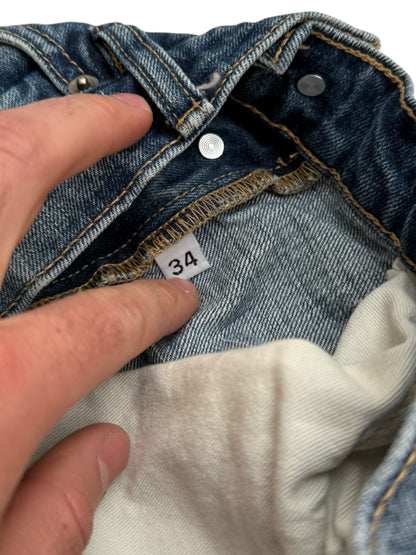 Distressed Blue Denim Jeans