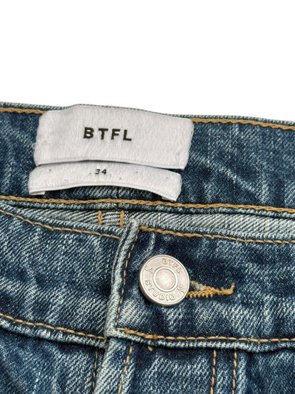 Distressed Blue Denim Jeans