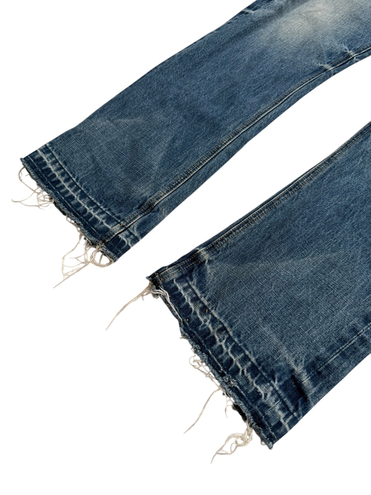 Distressed Blue Denim Jeans