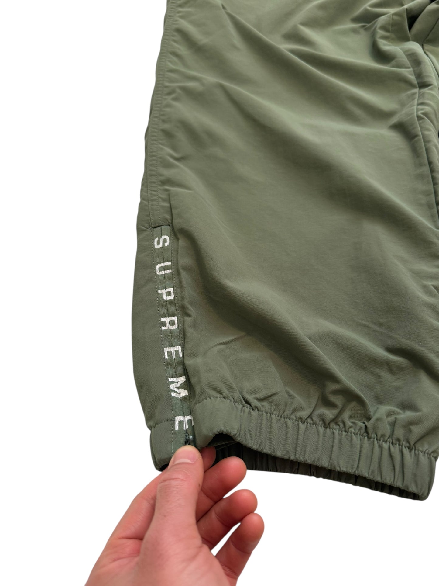 2023 Warmup Logo Zip Pants Olive