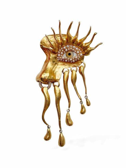 Gilded “Visage” Eye Brooch