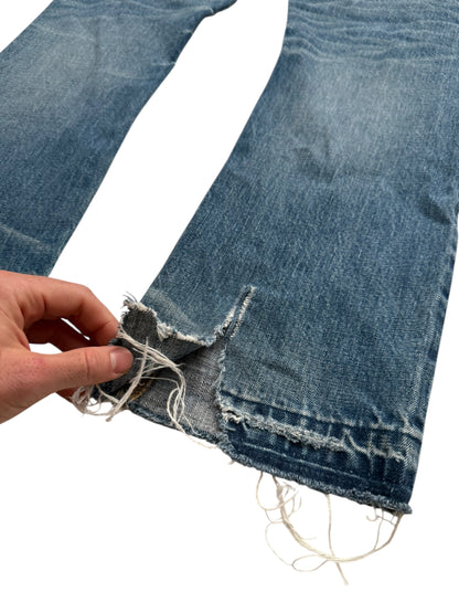 Distressed Blue Denim Jeans