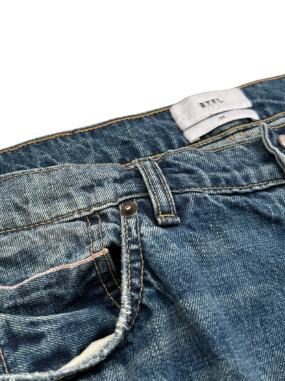 Distressed Blue Denim Jeans