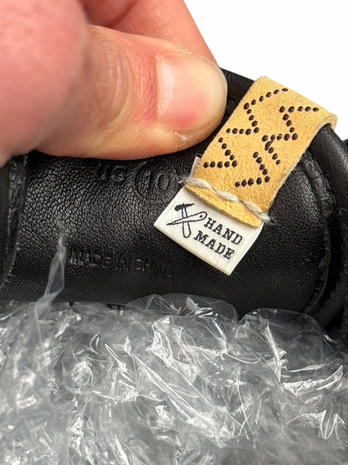 Walpi Suede Black Fringe Runner Sneaker